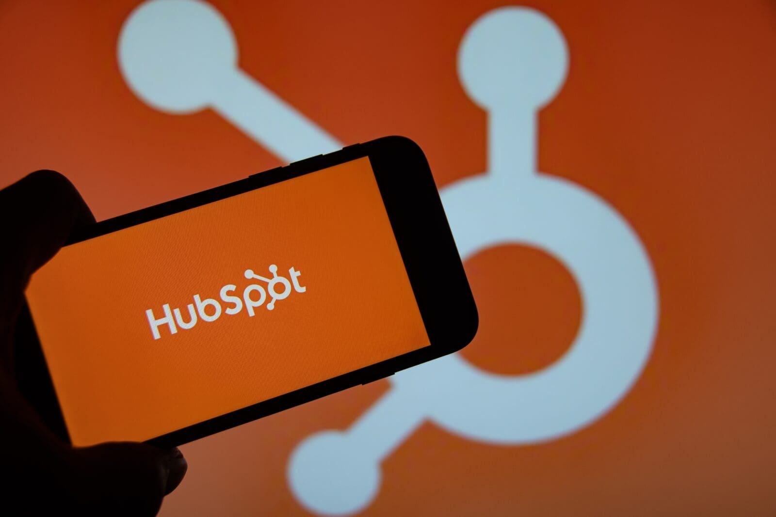 HubSpot logo on cell phone